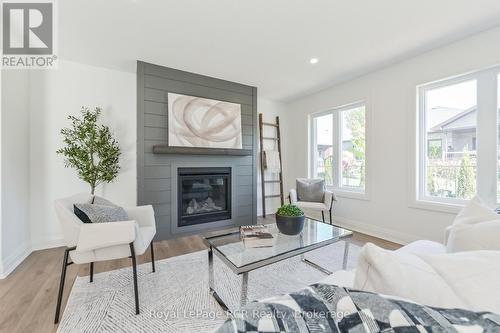 518 Newfoundland Street, Wellington North (Mount Forest), ON - Indoor Photo Showing Living Room With Fireplace