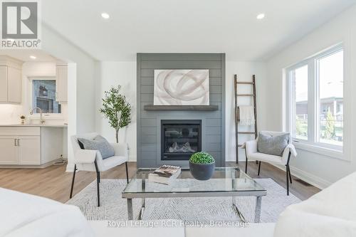 518 Newfoundland Street, Wellington North (Mount Forest), ON - Indoor Photo Showing Living Room With Fireplace