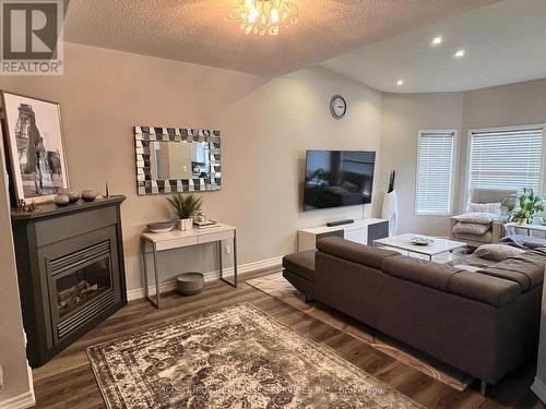 Upper - 3841 Talias Crescent, Mississauga, ON - Indoor Photo Showing Living Room With Fireplace