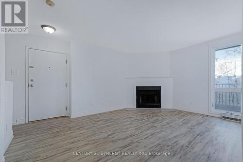 403 - 1589 St Bernard Street, Ottawa, ON - Indoor Photo Showing Living Room With Fireplace