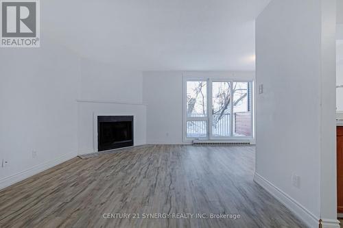 403 - 1589 St Bernard Street, Ottawa, ON - Indoor Photo Showing Living Room With Fireplace