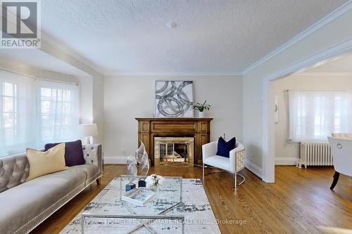 7 Mattice Road, Toronto, ON - Indoor Photo Showing Living Room With Fireplace