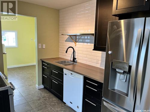 1307 11Th Street W, Saskatoon, SK - Indoor Photo Showing Kitchen With Double Sink