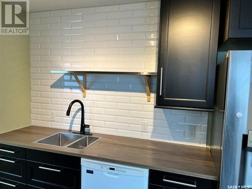 1307 11Th Street W, Saskatoon, SK - Indoor Photo Showing Kitchen With Double Sink