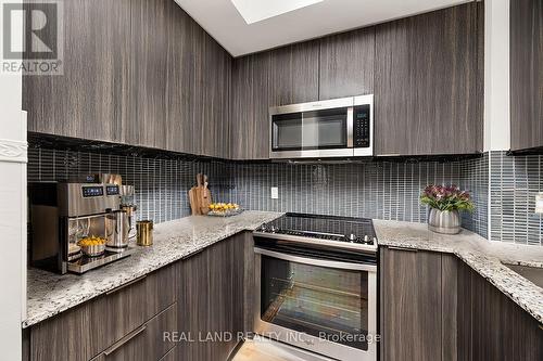 1208 - 20 Shore Breeze Drive, Toronto, ON - Indoor Photo Showing Kitchen With Upgraded Kitchen