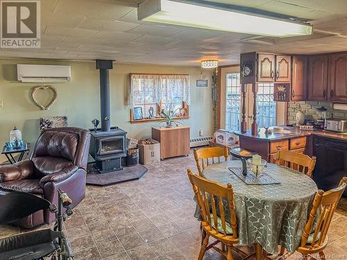 7660 Route 102, Lower Greenwich, NB - Indoor Photo Showing Dining Room With Fireplace