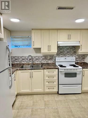 27 Evesham Crescent, Brampton, ON - Indoor Photo Showing Kitchen With Double Sink