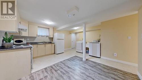 227 Hollyberry Trail, Toronto, ON - Indoor Photo Showing Kitchen With Double Sink