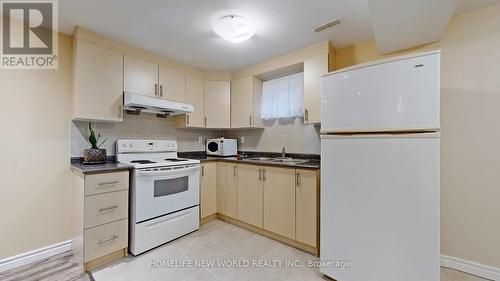 227 Hollyberry Trail, Toronto, ON - Indoor Photo Showing Kitchen With Double Sink