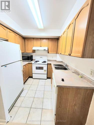 1209 - 26 Olive Avenue, Toronto, ON - Indoor Photo Showing Kitchen With Double Sink