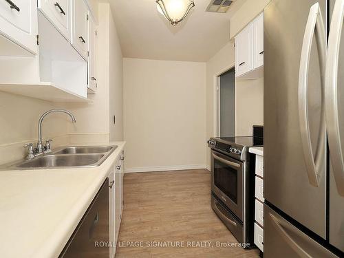 102-4005 Don Mills Rd, Toronto, ON - Indoor Photo Showing Kitchen With Double Sink