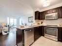 307-50 Via Rosedale Way, Brampton, ON  - Indoor Photo Showing Kitchen With Double Sink 