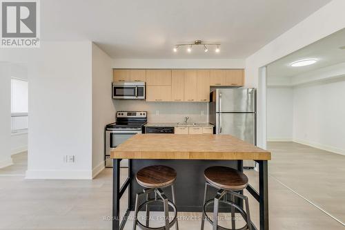 1223 - 38 Joe Shuster Way, Toronto, ON - Indoor Photo Showing Kitchen With Stainless Steel Kitchen