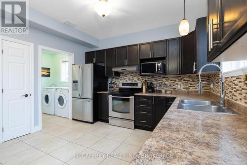 137 Amy Lynn Drive, Loyalist (Amherstview), ON - Indoor Photo Showing Kitchen With Double Sink