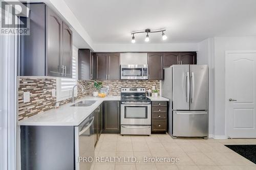 229 Cedric Terrace, Milton, ON - Indoor Photo Showing Kitchen With Stainless Steel Kitchen With Double Sink With Upgraded Kitchen