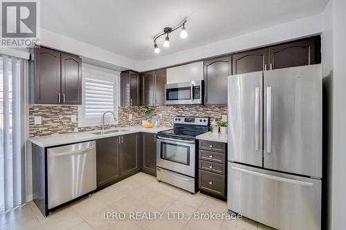 229 Cedric Terrace, Milton, ON - Indoor Photo Showing Kitchen With Stainless Steel Kitchen With Double Sink With Upgraded Kitchen