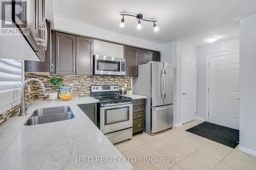 229 Cedric Terrace, Milton, ON - Indoor Photo Showing Kitchen With Stainless Steel Kitchen With Double Sink