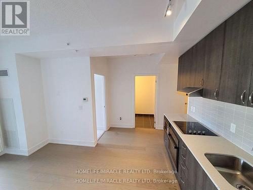 201 - 7 Kenaston Gardens, Toronto, ON - Indoor Photo Showing Kitchen With Double Sink