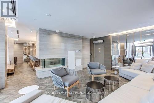 201 - 7 Kenaston Gardens, Toronto, ON - Indoor Photo Showing Living Room With Fireplace