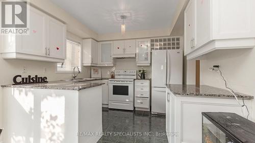 42 Caruso Drive, Brampton, ON - Indoor Photo Showing Kitchen With Double Sink