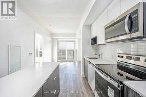 1310 - 202 Burnhamthorpe Road E, Mississauga, ON - Indoor Photo Showing Kitchen With Upgraded Kitchen