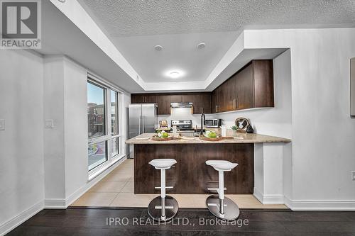 123 - 100 Dufay Road, Brampton, ON - Indoor Photo Showing Kitchen With Upgraded Kitchen