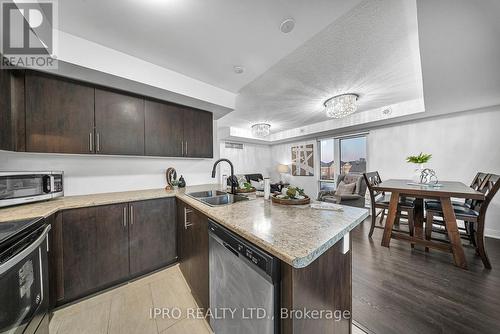 123 - 100 Dufay Road, Brampton, ON - Indoor Photo Showing Kitchen With Double Sink