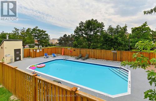 604 - 6720 Glen Erin Drive, Mississauga, ON - Outdoor With In Ground Pool With Backyard