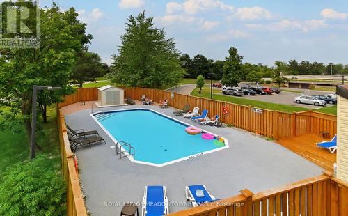 604 - 6720 Glen Erin Drive, Mississauga, ON - Outdoor With In Ground Pool