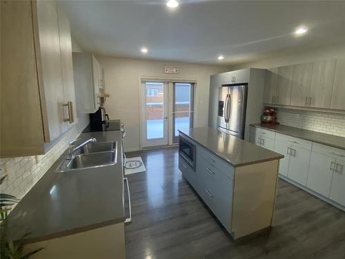 4 Ingstad Way, Brandon, MB - Indoor Photo Showing Kitchen With Double Sink