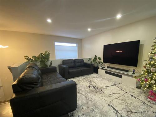 4 Ingstad Way, Brandon, MB - Indoor Photo Showing Living Room