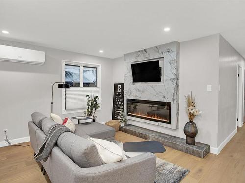 305 1550 Dease Street, Thunder Bay, ON - Indoor Photo Showing Living Room With Fireplace