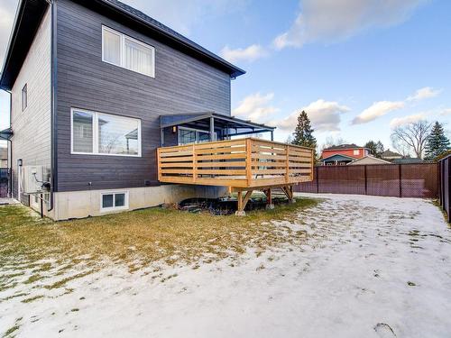 Back facade - 3481 Rue Bouthillier, Carignan, QC - Outdoor With Deck Patio Veranda With Exterior