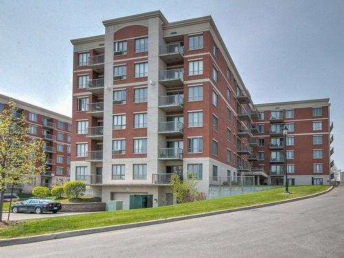 Frontage - 409-1550 Rue St-Louis, Montréal (Saint-Laurent), QC - Outdoor With Balcony With Facade