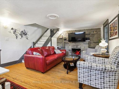 65 Queen St, St. Catharines, ON - Indoor Photo Showing Living Room With Fireplace