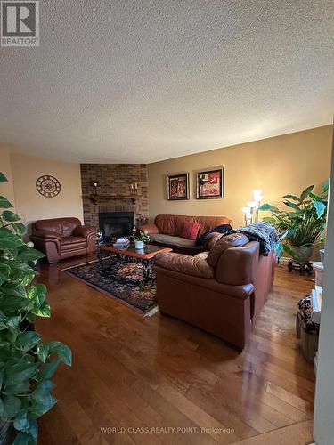 1612 Moongate Crescent, Mississauga, ON - Indoor Photo Showing Living Room With Fireplace