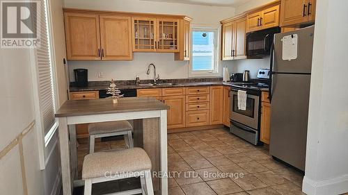 30 Fern Avenue, Timmins (Sp - Main Area), ON - Indoor Photo Showing Kitchen With Double Sink