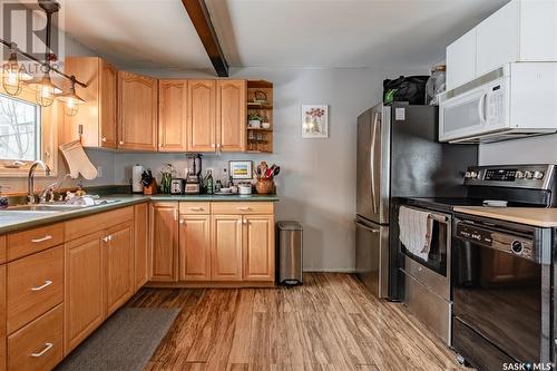 231 Home Street W, Moose Jaw, SK - Indoor Photo Showing Kitchen With Double Sink