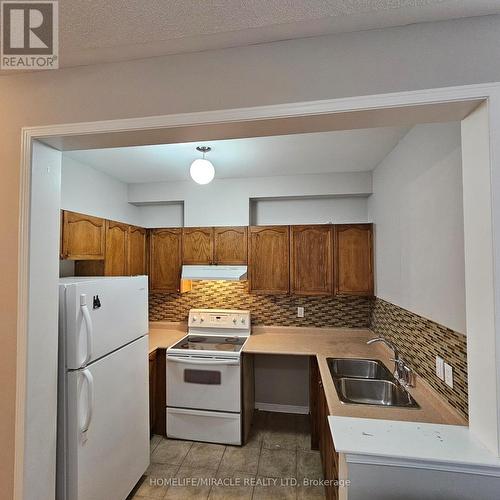 76 Rubysilver Drive, Brampton, ON - Indoor Photo Showing Kitchen With Double Sink