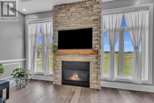 389 Concession 4 Road, Haldimand, ON - Indoor Photo Showing Living Room With Fireplace