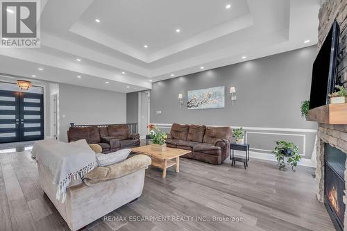 389 Concession 4 Road, Haldimand, ON - Indoor Photo Showing Living Room With Fireplace