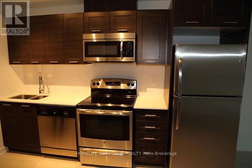 513 - 20 Bruyeres Mews, Toronto, ON - Indoor Photo Showing Kitchen With Double Sink