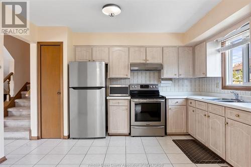 5810 Ninth Street, Lasalle, ON - Indoor Photo Showing Kitchen With Double Sink