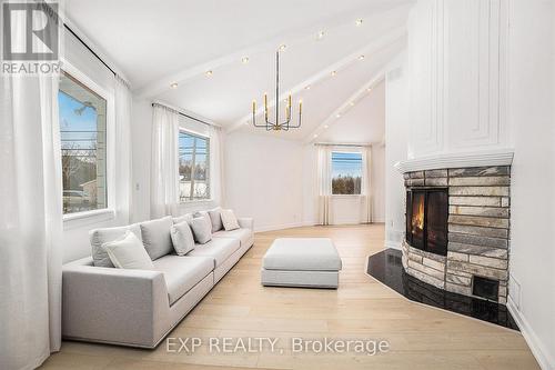 6974 Bank Street, Ottawa, ON - Indoor Photo Showing Living Room With Fireplace