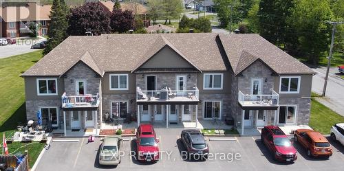 75 Kenyon Street E, North Glengarry, ON - Outdoor With Balcony With Facade