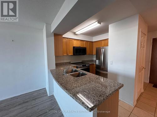 1110 - 4889 Kimbermount Avenue, Mississauga, ON - Indoor Photo Showing Kitchen With Double Sink