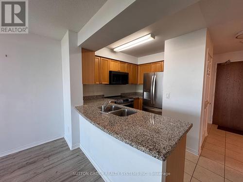 1110 - 4889 Kimbermount Avenue, Mississauga, ON - Indoor Photo Showing Kitchen With Double Sink