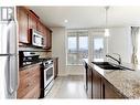 1160 Bernard Avenue Unit# 304, Kelowna, BC  - Indoor Photo Showing Kitchen With Double Sink With Upgraded Kitchen 