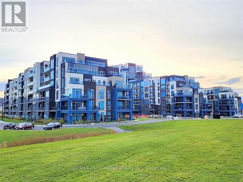 546 - 16 Concord Place, Grimsby, ON - Outdoor With Balcony With Facade