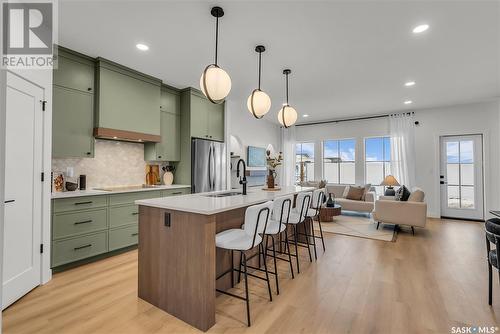 4 720 Brighton Boulevard, Saskatoon, SK - Indoor Photo Showing Kitchen With Upgraded Kitchen